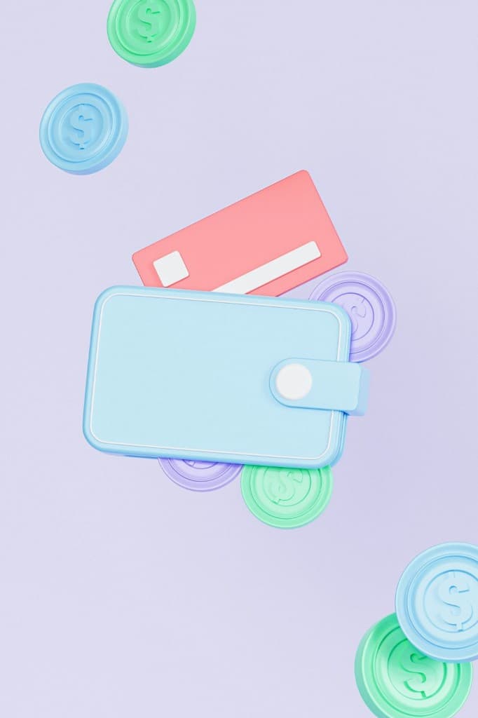 Colorful wallet and cards surrounded by coins, symbolizing different ways to use health spending accounts wisely.