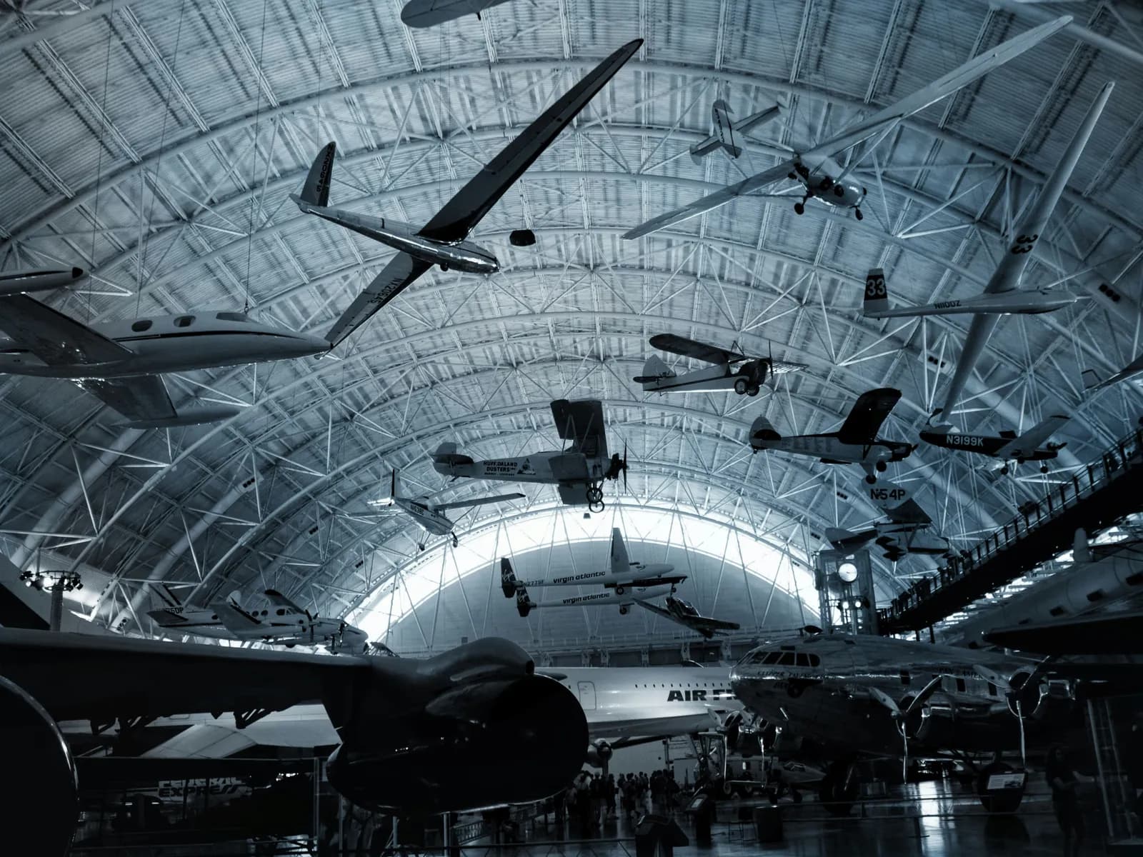 Aircraft suspended in an aerospace hangar