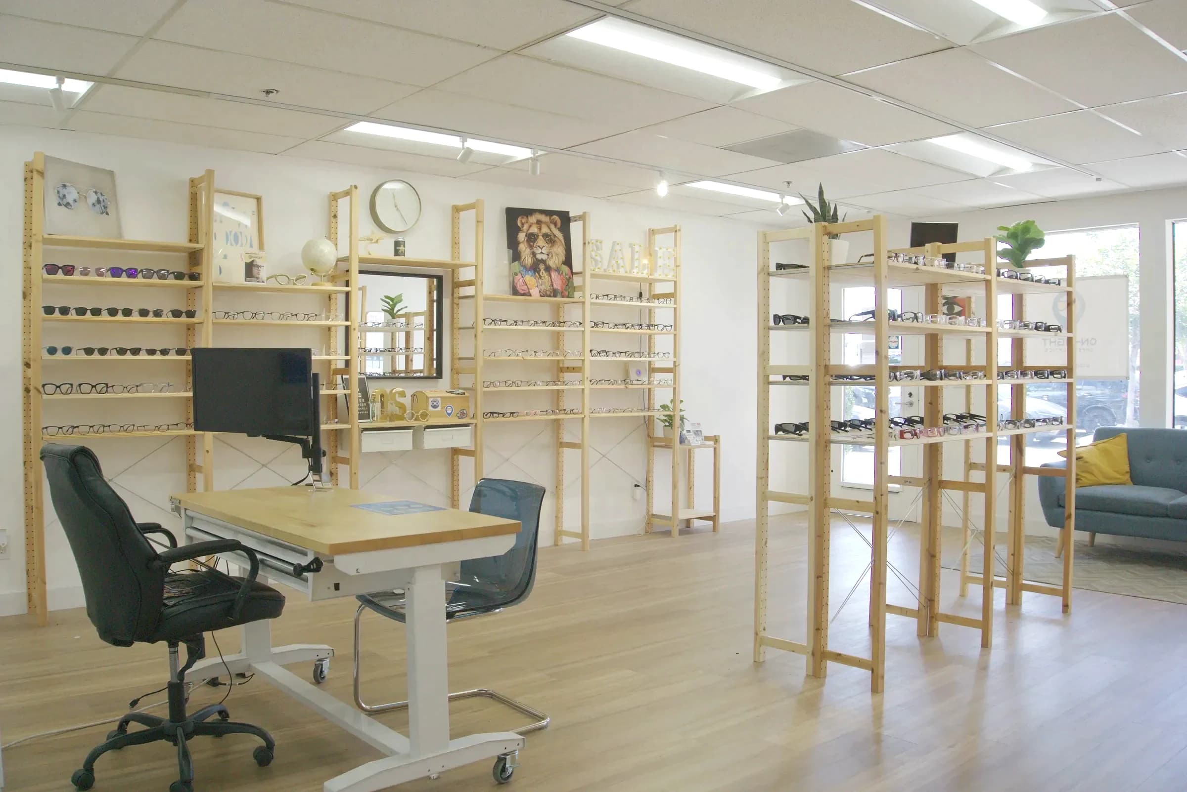 The showroom fitting desk, with a monitor and chair set up for an appointment